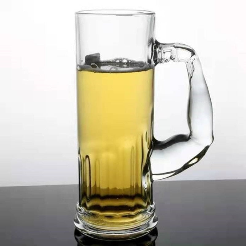 tall glass of beer with handle by glasscias