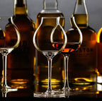 tulip glasses whiskey on a bar