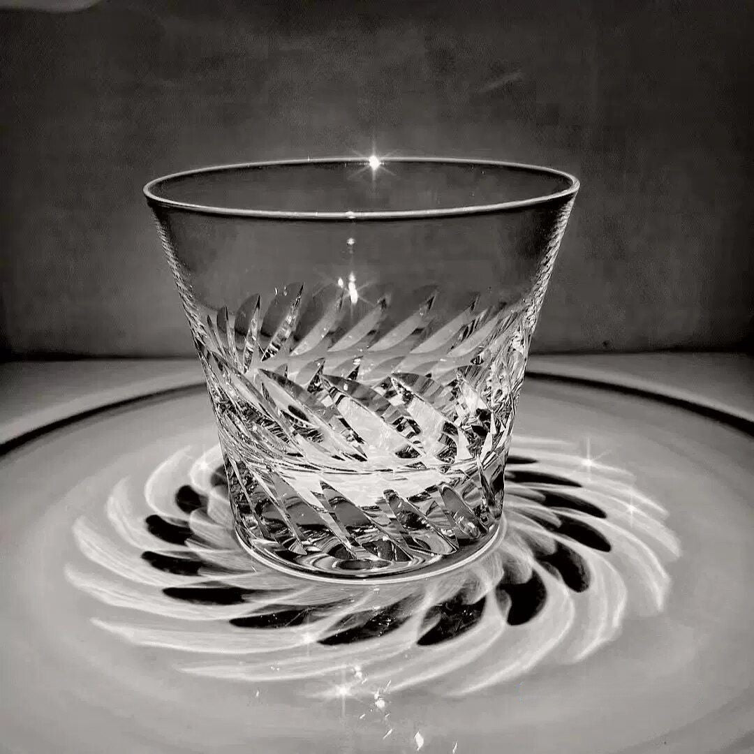 Crystal whiskey glass with graceful wing-inspired texture