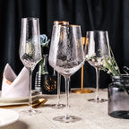 hammered wine glass with gold rim on top
