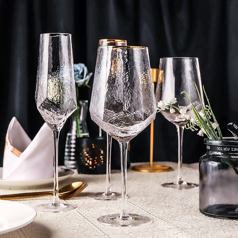 hammered wine glass with gold rim on top