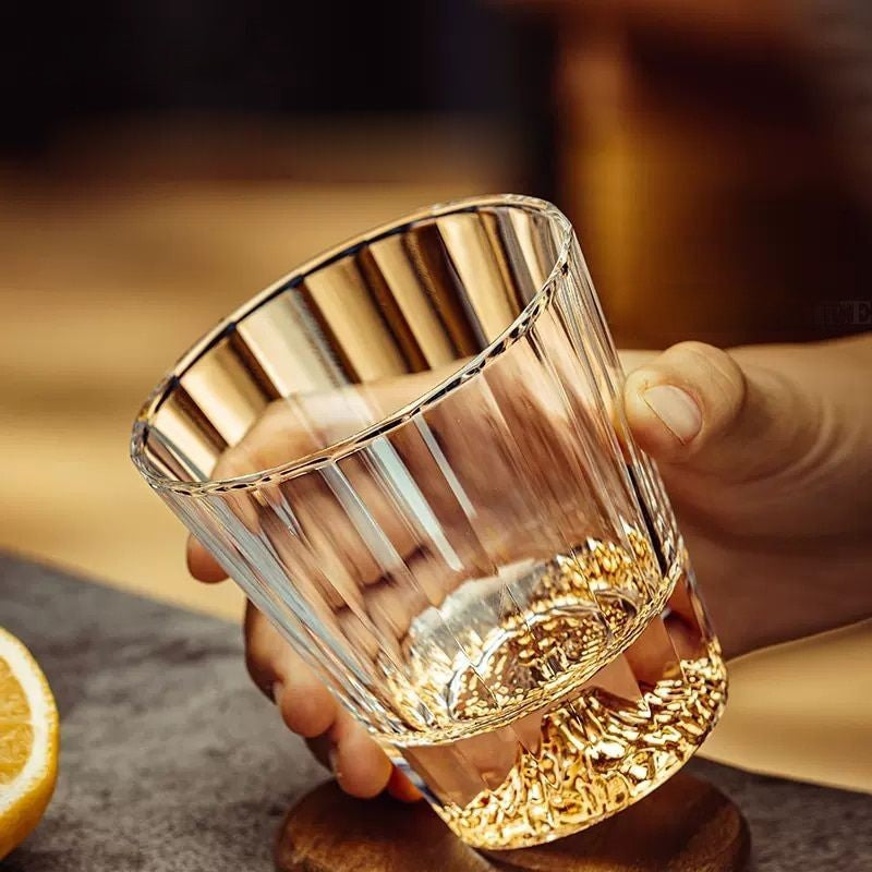 Holding a crystal clear luxury whiskey glass | Glasscias